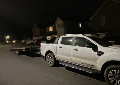 Ford Ranger with vehicle transport trailer